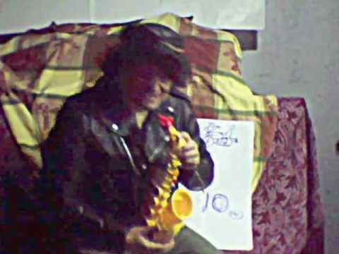 A Biker Plays a Toy Saxophone #1.AVI