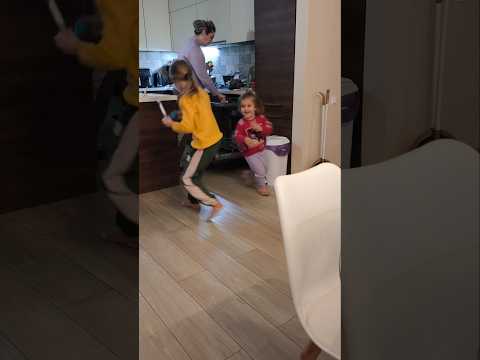 Siblings Playing with ballons