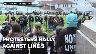 Protesters rally against Line 5, Harbor Hall lawsuit, PFAS, boat auction