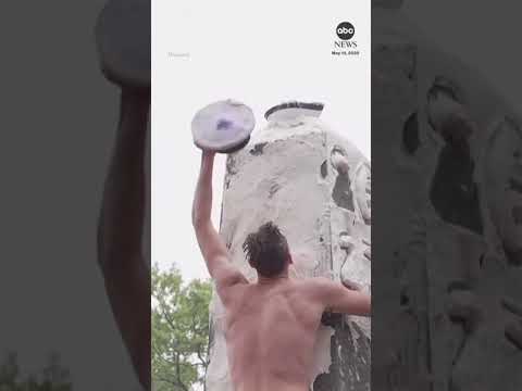 Navy plebes complete annual greased monument climb