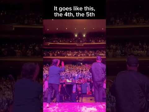1 iPhone, 1 guitar + 2000 strangers sing Leonard Cohen’s Hallelujah in perfect harmony. SING ALONG!