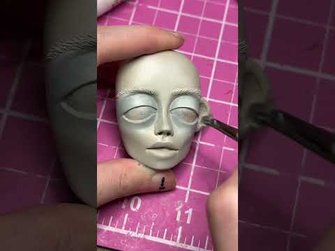 sculpture of jackie in yellowjackets