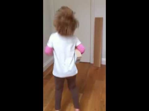 Nina rockin' out to Radiohead with here handmade guitar
