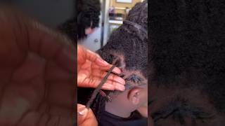Loc Smithing smooths out frizzy locs and assists in retwisting the hair. #shorts #location #locs