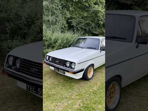 Ford Escort RS2000 1978.  Looks stunning in white with gold minilite wheels. #fastfords #fastcars