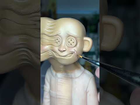 sculpture of wybie in coraline
