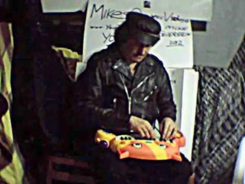 A Biker Plays A Cat Piano  # 3