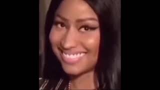 Stan Twitter: Nicki Minaj smiling and then looks around confused 😕