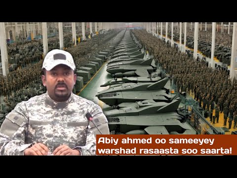 Abiye oo dhoolatus ahaan ku tagay warshad Rasaas soo saarta iyo Isiyaas oo ciidan hor qoranayo..