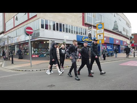 blackpool saturday afternoon walking around seafront and shopping area . ppl watching in Blackpool