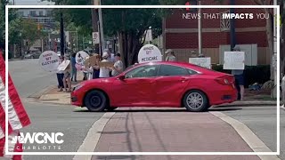 Crowd protests Trump policies in Plaza Midwood