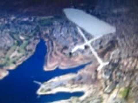 ironing board UFO...    over 116 basketball courts long,hovering over San Diego,Ca.