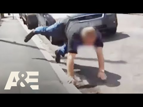 Driver Trips and Falls After Heated Showdown with Cyclist | Road Wars | A&E