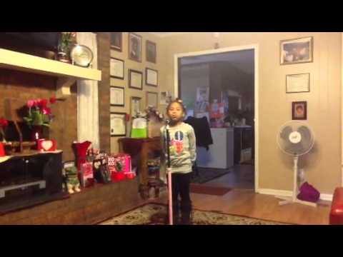 Elysia singing Break Every Chain