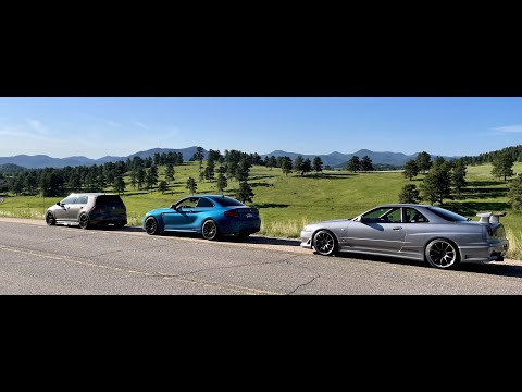 R34 GTT, F87 M2C, and Mk7 Golf R cruising down a mountain