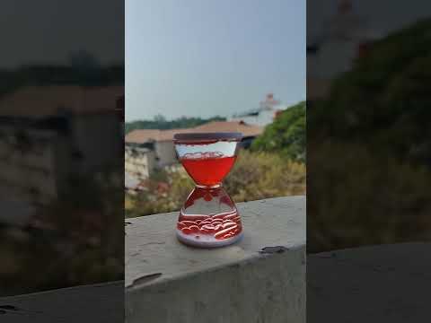An hour glass made out of oil and water #time #slowmotion #physics
