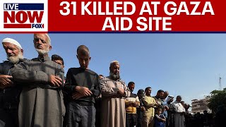 Israel’s military denies involvement after dozens killed in Gaza, near aid sites
