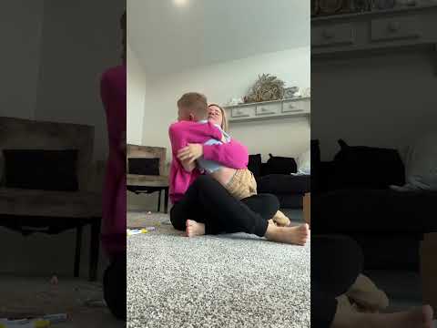 We call this the struggle cuddle at our house. 😂 #momhumor #parenting #imomsohard
